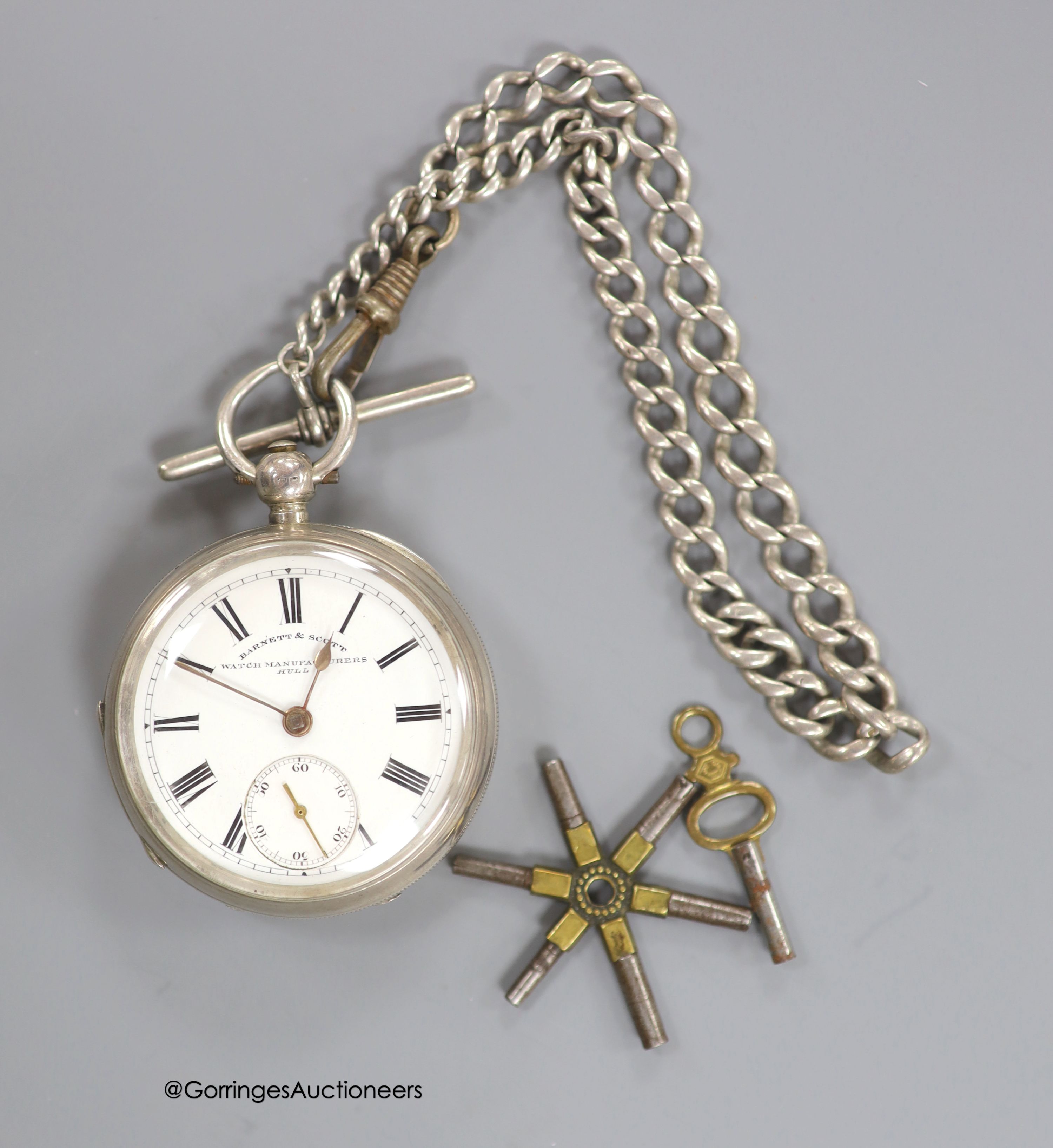 A late Victorian silver open face keywind pocket watch by Barnett & Scott, on a silver albert with key and multi key 'wheel'.